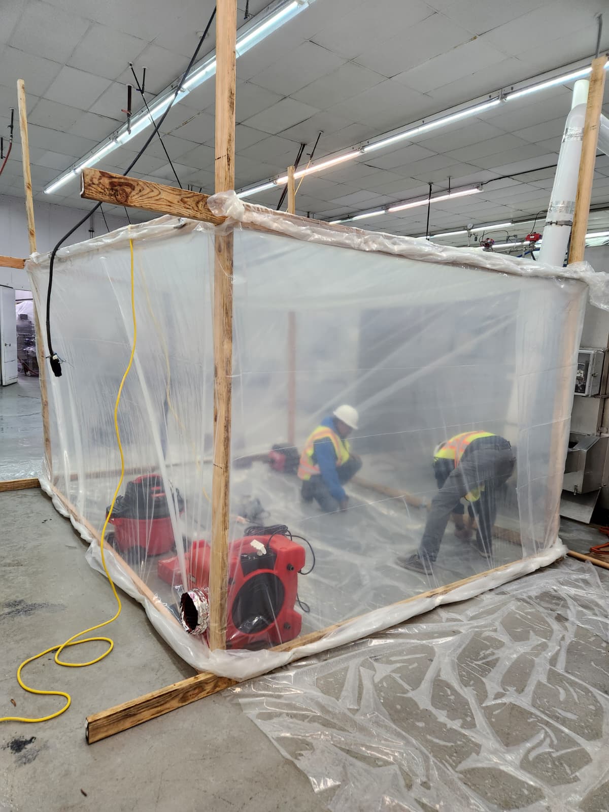 A dust containment setup designed by Facilities Plumbing And Drain.