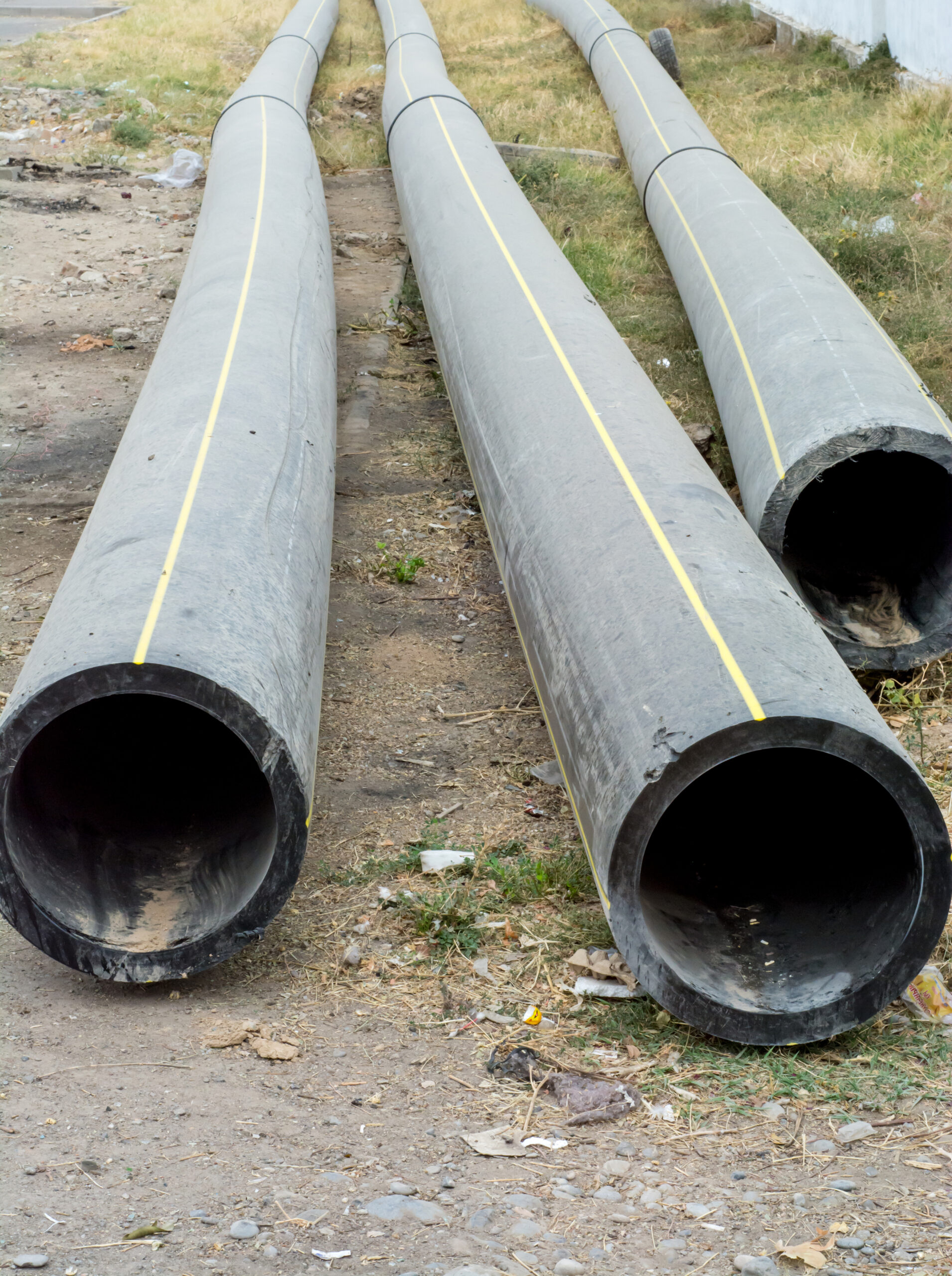 Large black sewer lines for a commercial facility in Palo Alto, CA.