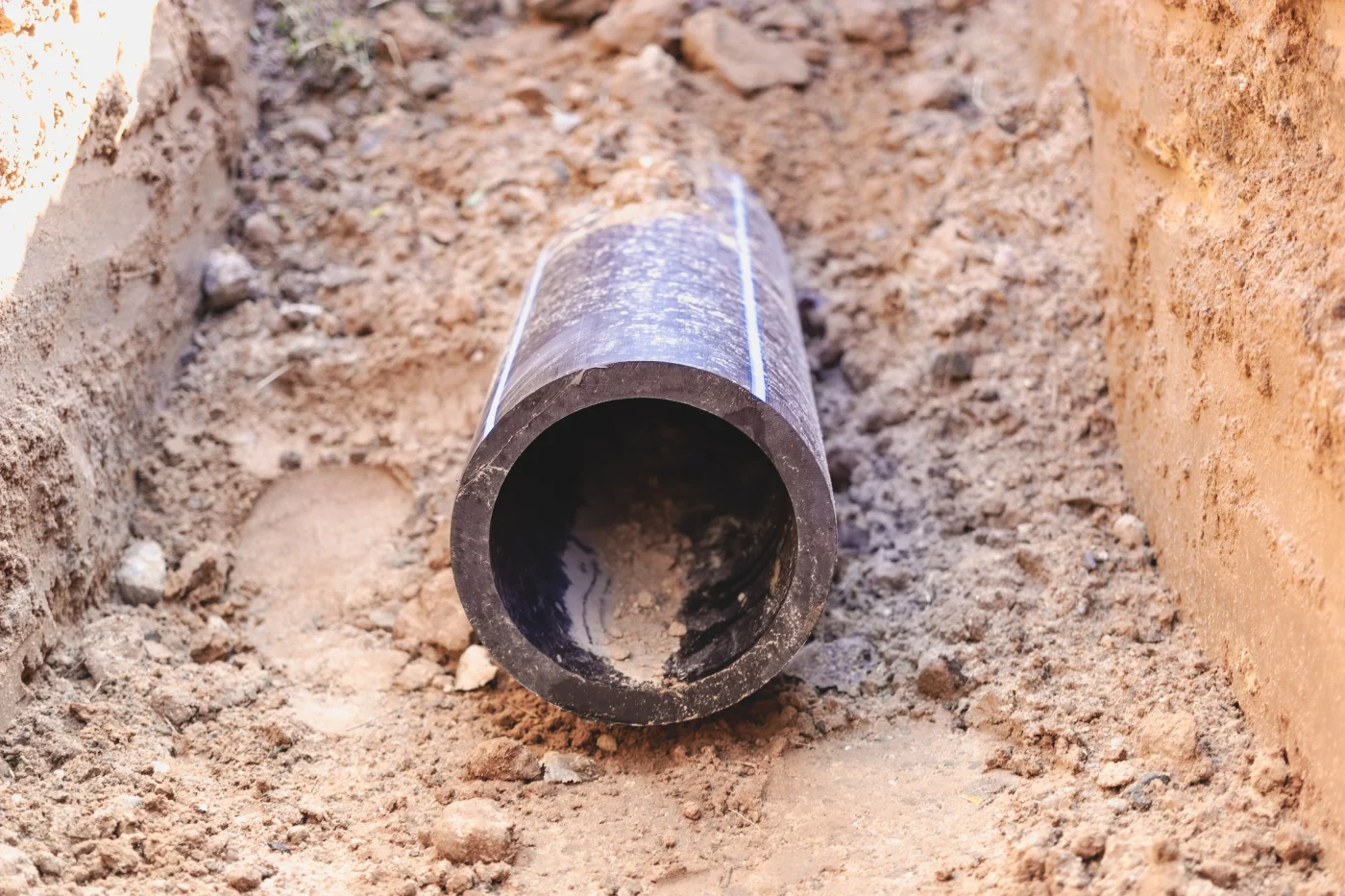 Sewer line in the dirt during a sewer line replacement in Berkeley, CA.