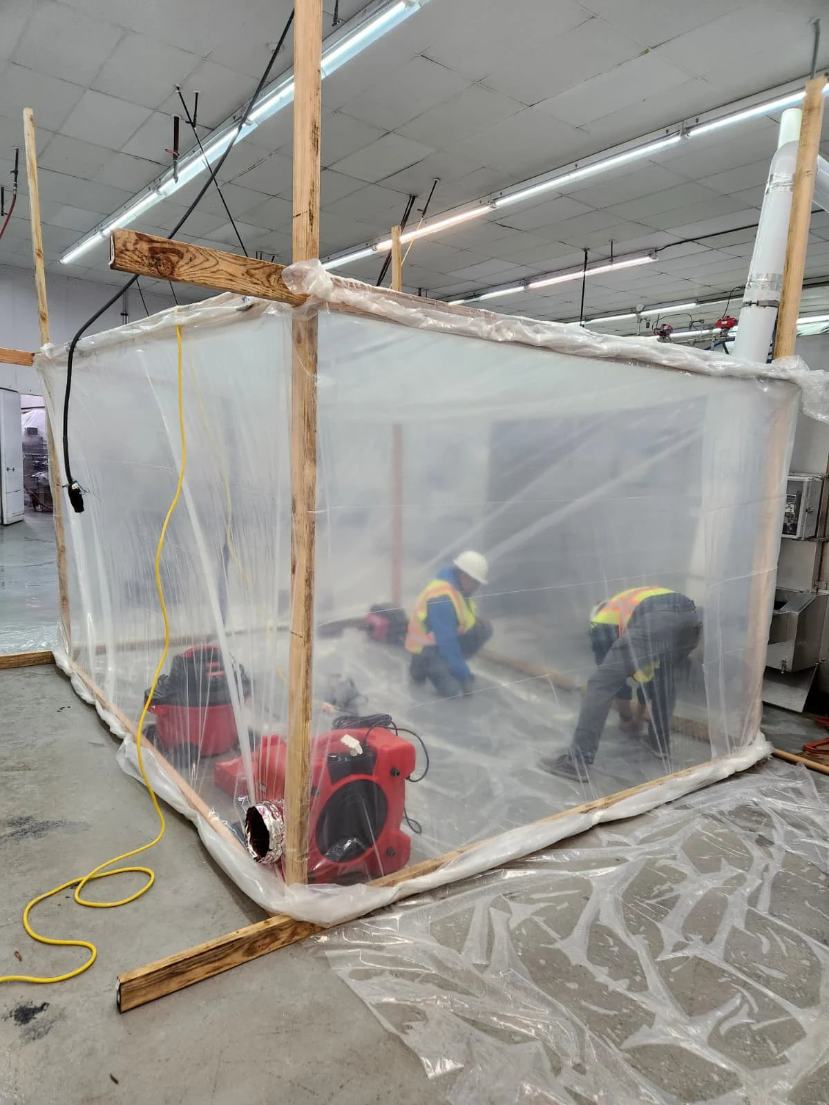 A dust containment setup designed by Facilities Plumbing And Drain.